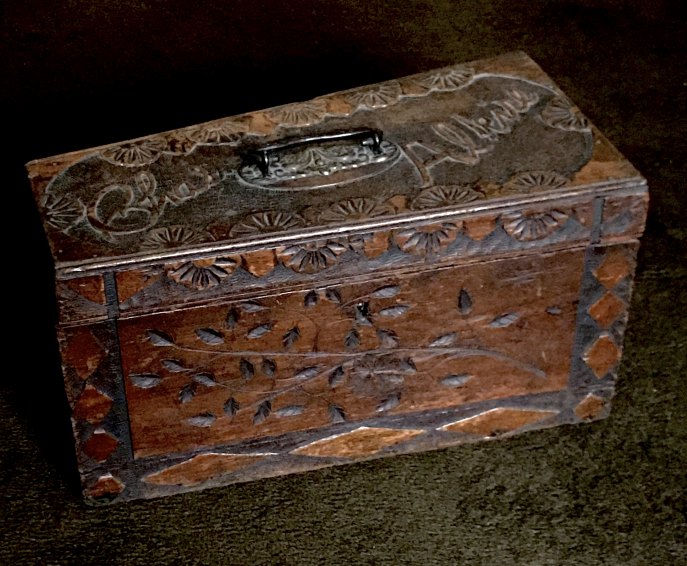 CORNET CASE IN CARVED WOOD